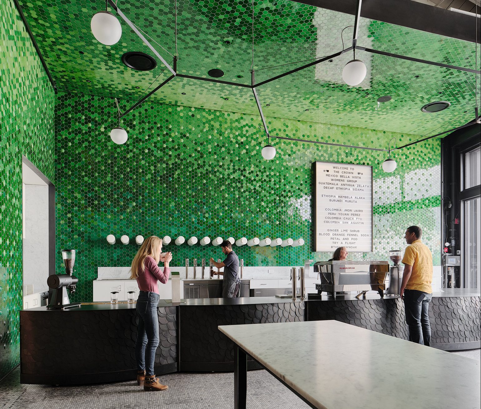 guests enjoy coffee in The Tasting Room